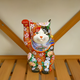 KUTANI WARE LUCKY CAT (MANEKI NEKO) RED AND BLACK FLORAL RAISED DECORATION (RIGHT)